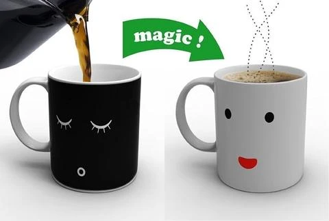 Two coloring changing coffee mugs, one cold and one hot