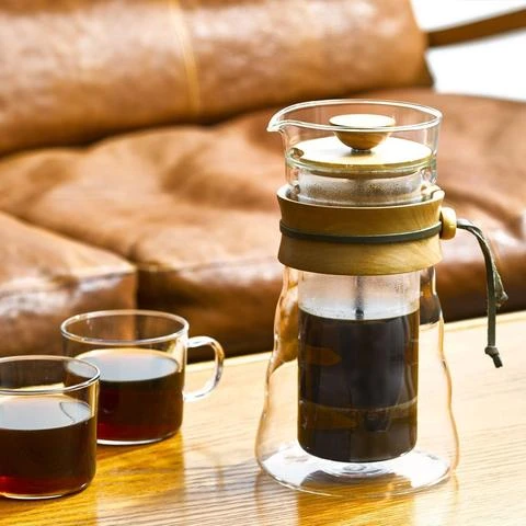 French press made from glass and olive wood