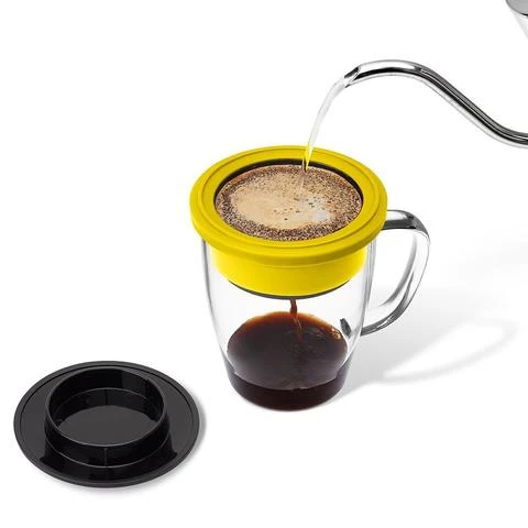 Travel pour over coffee maker in use